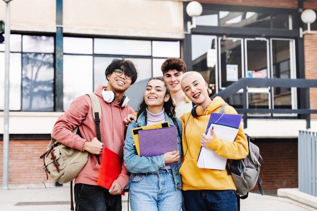 group of students smiling to camera